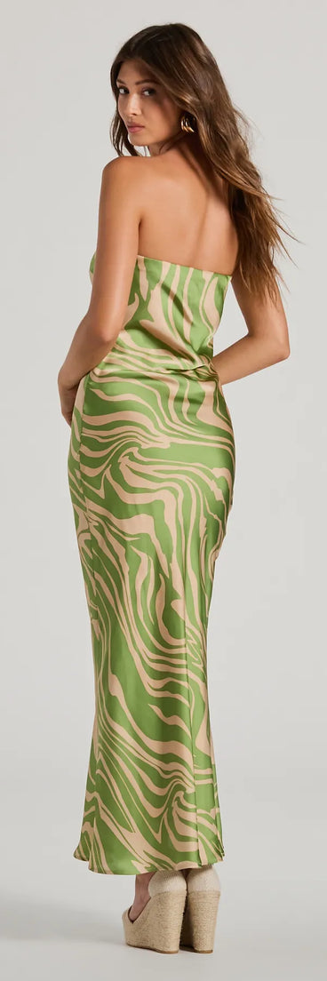 The Fierce Stripes Strapless Zebra Print Satin Maxi Dress is a natural dress, an essential holiday or NYE dress that pairs chic style with versatility making it perfect for cocktail events, New Year's Eve parties, or as a winter wedding guest look.