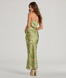 The Fierce Stripes Strapless Zebra Print Satin Maxi Dress is a natural dress, an essential holiday or NYE dress that pairs chic style with versatility making it perfect for cocktail events, New Year's Eve parties, or as a winter wedding guest look.
