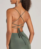 Revamp your 2025 wardrobe with this chic addition, the Thriving Poise Lace-Up Side Slit Midi Dress in green, perfect for elevating your style in the new year.
