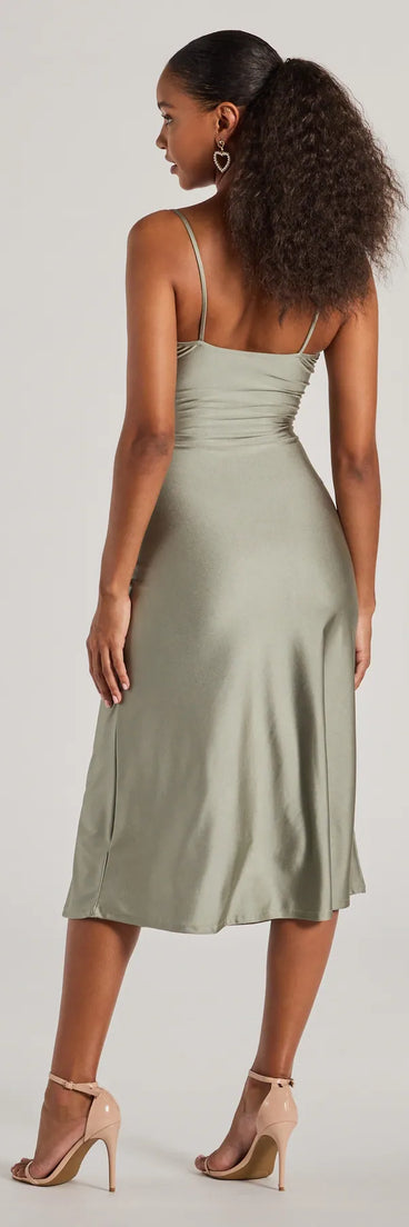 Revamp your 2025 wardrobe with this chic addition, the Cause To Celebrate V-Neck A-Line Midi Dress in sage green, perfect for elevating your style in the new year.