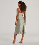 Revamp your 2025 wardrobe with this chic addition, the Cause To Celebrate V-Neck A-Line Midi Dress in sage green, perfect for elevating your style in the new year.
