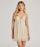 The Love Of Details V-Neck Lace-Up Skater Dress is a mini dress that will make a statement with its short hemline and on-trend details to have you ready for any event!