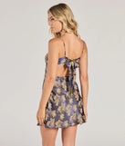 The Tied To You Lace Trim A-Line Floral Satin Dress is a stylish navy floral dress featuring a fresh seasonal print and flattering design, perfect for garden parties, bridal showers, Valentine's Day celebrations, or everyday spring styling.