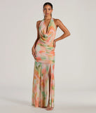The Bohemain Charm Halter Open Back Tie Dye Maxi Dress is a casual dress for more than special occasions with a fitted or flowy silhouette and accents in the most recent trends!