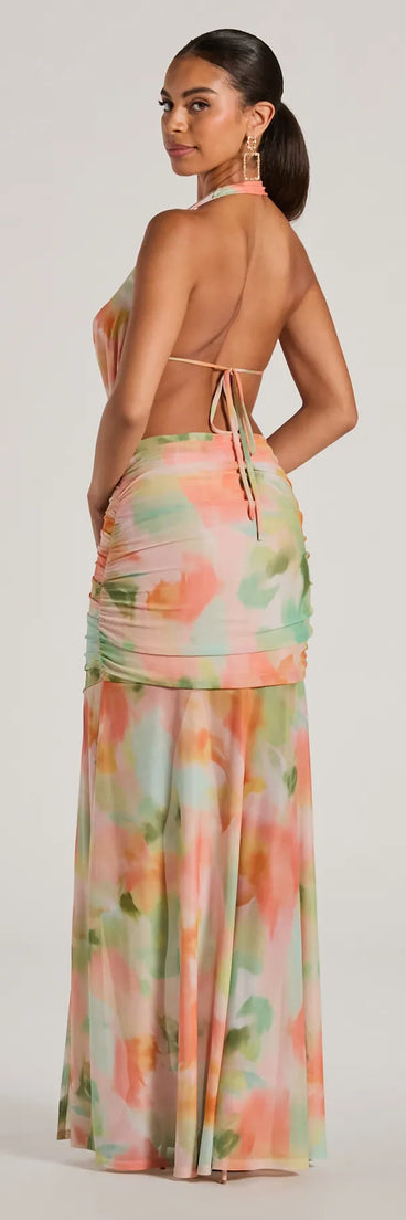The Bohemain Charm Halter Open Back Tie Dye Maxi Dress is a casual dress for more than special occasions with a fitted or flowy silhouette and accents in the most recent trends!