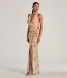 The Bohemain Charm Halter Open Back Tie Dye Maxi Dress is a casual dress for more than special occasions with a fitted or flowy silhouette and accents in the most recent trends!