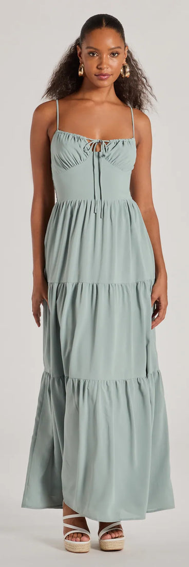 The Casually Chic Sleeveless Ruffled Maxi Dress in sage green brings edge and energy to your vibe, ready to elevate any festival look or concert outfit.