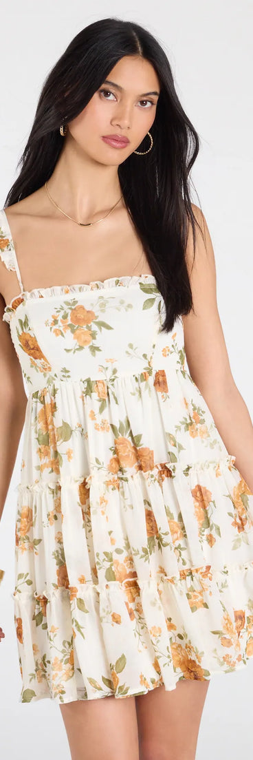 Step into the new season looking effortlessly chic in the Sunshine Romance Floral Babydoll Dress in ivory, a must-have Windsor dress for your cool-weather wardrobe.