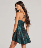 Revamp your 2025 wardrobe with this chic addition, the Capture Hearts V-Neck Embroidered Skater Dress in hunter green, perfect for elevating your style in the new year.