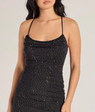 Make a bold statement in the The Shine Factor Rhinestone Asymmetrical Midi Dress in black, the perfect spring dress for weddings, cocktail hours, nights out, and/or seasonal celebrations.