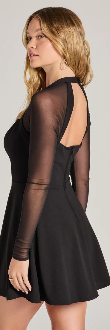 Revamp your 2025 wardrobe with this chic addition, the Chic And Sweet Long Sleeve Skater Dress in black, perfect for elevating your style in the new year.