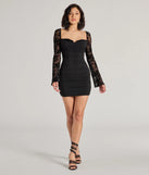 Make a bold statement in the Chic Drama Flocked Floral Long Sleeve Mini Dress in black, the perfect summer dress for weddings, cocktail hours, nights out, and/or seasonal celebrations.