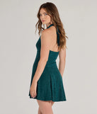 Revamp your 2025 wardrobe with this chic addition, the Bring the Glam Glitter Halter Skater Dress in hunter green, perfect for elevating your style in the new year.