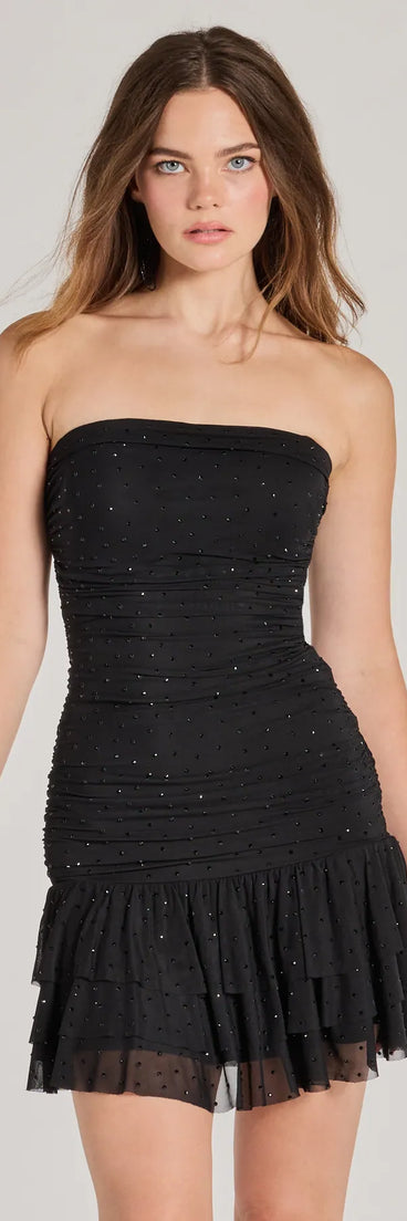 Step into winter chic with the Trendy-Glam Rhinestone Mesh Drop Waist Mini Dress, a black mini dress featuring an above-the-knee cut ideal for cocktail parties, festive gatherings, or clubwear.