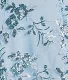 Step into seasonal chic with the Pretty Elegance Tulle Lace-Up Floral Sequin Mini Dress, a light blue mini dress featuring an above-the-knee cut ideal for cocktail parties, festive gatherings, or clubwear.