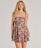Step into seasonal chic with the Sweet Flirt Floral Lace Skater Dress, a pink mini dress featuring an above-the-knee cut ideal for cocktail parties, festive gatherings, or clubwear.