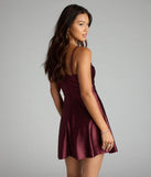 Feel ready for every dance floor moment or feed-worthy reel in the Twinkle Season Glitter Satin Skater Dress, a wine homecoming dress designed to own your moment.