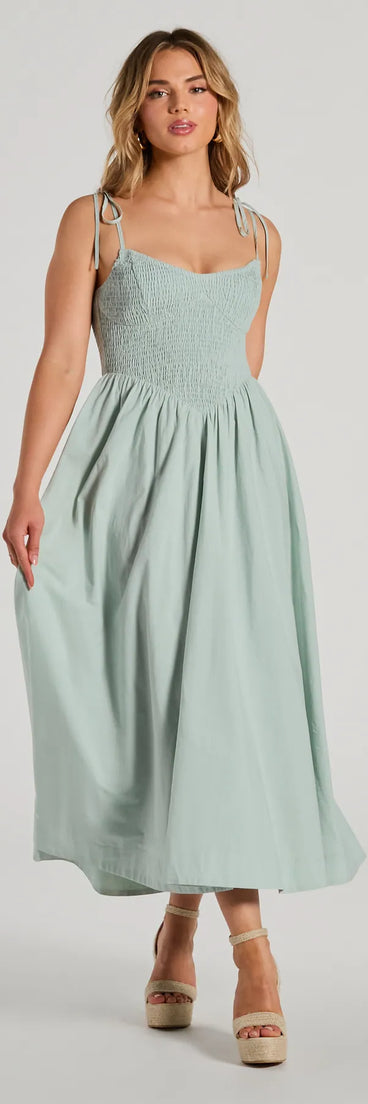 The midi dress length on the Picture Perfect V-Neck Smocked A-Line Midi Dress provides an elevated silhouette perfect for any party, occasion, or everyday styling.