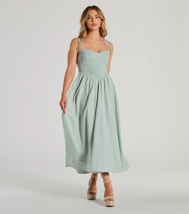 The midi dress length on the Picture Perfect V-Neck Smocked A-Line Midi Dress provides an elevated silhouette perfect for any party, occasion, or everyday styling.