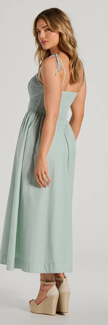 The Picture Perfect V-Neck Smocked A-Line Midi Dress is a mint green midi dress, featuring an elevated midi-length silhouette perfect for wedding guest attire, romantic date nights, or effortless everyday styling.