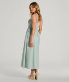 The Picture Perfect V-Neck Smocked A-Line Midi Dress is a mint green midi dress, featuring an elevated midi-length silhouette perfect for wedding guest attire, romantic date nights, or effortless everyday styling.
