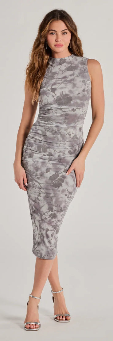 With its mid-calf hem and popular flattering fit, the Chic Girl Flocked Mesh Mock Neck Midi Dress in gray nails the balance of trend and ease, redefining go-to midi dresses for any occasion.