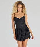 Step into seasonal chic with the Adorable Muse Ruffled Lace Skater Dress, a black mini dress featuring an above-the-knee cut ideal for cocktail parties, festive gatherings, or clubwear.