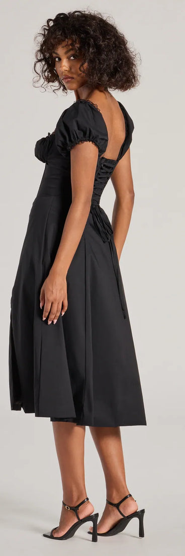 Revamp your 2025 wardrobe with this chic addition, the Flawless Puff Sleeve Corset Midi Dress in black, perfect for elevating your style in the new year.