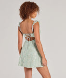 Shine with confidence, elegance, and standout style in the Enchanting Impression Butterfly Lace-Up Skater Dress—a sage green graduation dress designed with a fresh silhouette and the latest trends.