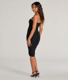 Revamp your 2025 wardrobe with this chic addition, the Sleek Sophistication Sleeveless Ruched Midi Dress in black, perfect for elevating your style in the new year.