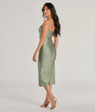 Revamp your 2025 wardrobe with this chic addition, the Chic Arrival Cutout Bodycon Midi Dress in sage green, perfect for elevating your style in the new year.