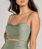 Make a bold statement in the Chic Arrival Cutout Bodycon Midi Dress in sage green, the perfect green dress for weddings, cocktail hours, nights out, and/or seasonal celebrations.