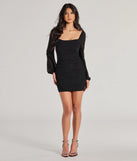 Make a bold statement in the Alluring Shine Rhinestone Mesh Long Sleeve Mini Dress in black, the perfect spring dress for weddings, cocktail hours, nights out, and/or seasonal celebrations.