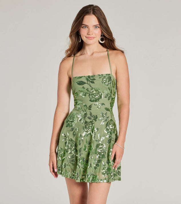 Turn heads in the beaming Sparkling Beauty Lace-Up Floral Sequin Skater Dress, a stunning sage sequin dress designed to add sparkle and elegance to your next night out or special occasion.