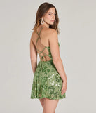 The Sparkling Beauty Lace-Up Floral Sequin Skater Dress is a mini dress that will make a statement with its short hemline and on-trend details to have you ready for any event!