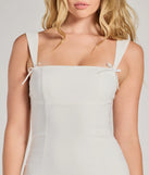 Find your chic look with the Effortless And Chic Bow Trim Mini Dress, a white mini dress featuring an above-the-knee cut ideal for cocktail parties, festive gatherings, or clubwear.
