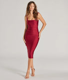 The Majorly Stunning Sleeveless Bodycon Midi Dress in wine is a modern red dress featuring trendy details and a stunning design ideal for wedding guest dresses, elegant cocktail looks, or an alluring Valentine’s Day dress.