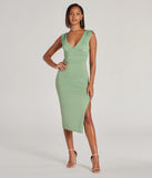 Revamp your 2025 wardrobe with this chic addition, the Make It Stunning Sleeveless Bodycon Slit Midi Dress in sage green, perfect for elevating your style in the new year.