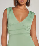 Revamp your 2025 wardrobe with this chic addition, the Make It Stunning Sleeveless Bodycon Slit Midi Dress in sage green, perfect for elevating your style in the new year.