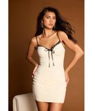 The Delicate Love Bow V-Neck Lace Mini Dress is a stylish lace dress, designed with intricate lace and an alluring silhouette, making it an elegant choice for Valentine's Day, weddings, or effortless spring looks.