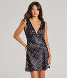 Step into seasonal chic with the Spotted You V-Neck Polka Dot A-Line Mini Dress, a black mini dress featuring an above-the-knee cut ideal for cocktail parties, festive gatherings, or clubwear.