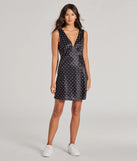 Revamp your 2025 wardrobe with this chic addition, the Spotted You V-Neck Polka Dot A-Line Mini Dress in black, perfect for elevating your style in the new year.