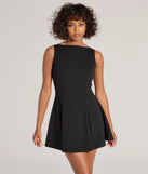 Step into winter chic with the Timeless Elegance Boat Neck Crepe Skater Dress, a black mini dress featuring an above-the-knee cut ideal for cocktail parties, festive gatherings, or clubwear.
