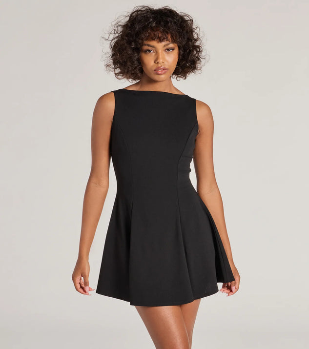 Step into winter chic with the Timeless Elegance Boat Neck Crepe Skater Dress, a black mini dress featuring an above-the-knee cut ideal for cocktail parties, festive gatherings, or clubwear.
