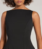 Step into winter chic with the Timeless Elegance Boat Neck Crepe Skater Dress, a black mini dress featuring an above-the-knee cut ideal for cocktail parties, festive gatherings, or clubwear.