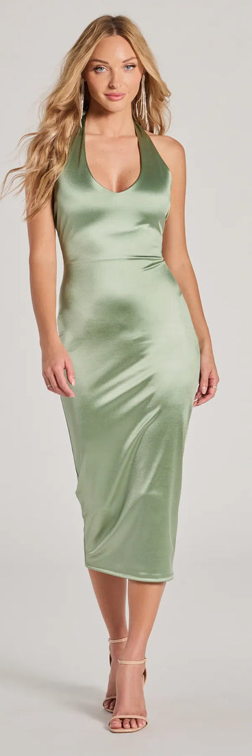 Turn heads at Prom 2025 in this sage green prom dress, where statement-making details meet the iconic style of the Celebrate Love Halter V-Neck Bodycon Satin Midi Dress .