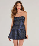 Step into seasonal chic with the Chic Romance Floral Satin Lace-Up Skater Dress, a multi-color mini dress featuring an above-the-knee cut ideal for cocktail parties, festive gatherings, or clubwear.