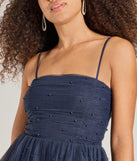 Step into Prom 2025 in a navy blue prom dress, where unique Windsor accents and the standout Major Stunner Tulle and Pearl Skater Dress style come together.