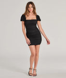 Make a bold statement in the Delicate Expression Bow Back Chiffon Mini Dress in black, the perfect spring dress for weddings, cocktail hours, nights out, and/or seasonal celebrations.