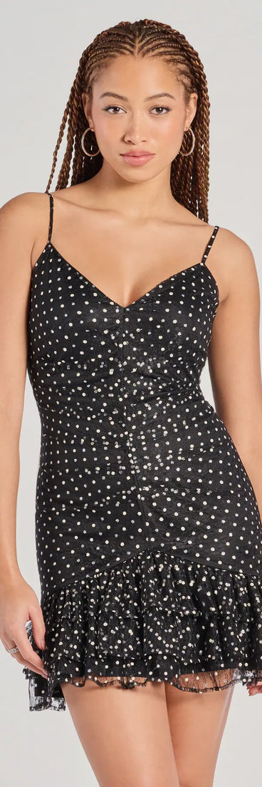 Make a bold statement in the Sparkly Night Polka Dot Glitter Mesh Mini Dress in black, the perfect summer dress for weddings, cocktail hours, nights out, and/or seasonal celebrations.